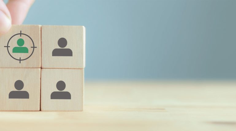 Wooden block with a target customer audience represented on one